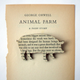 Image for article titled Brooches Made From Classic Books Let You Wear Your Favorite Words
